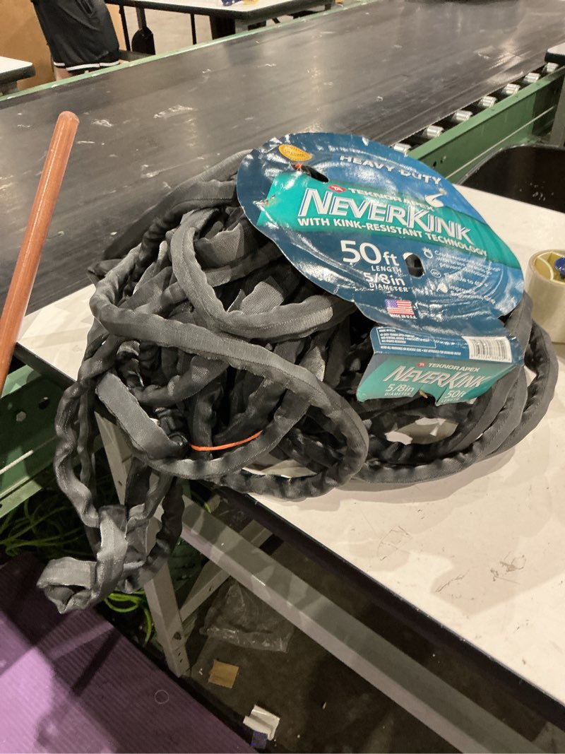 Condition photo showing As Is for neverkink teknor apex 5/8-in x 50-ft heavy kink free vinyl gray coiled hose