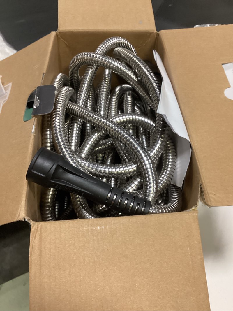 Condition photo showing Good Condition for bionic steel 100 ft metal garden hose with sprayer nozzle, non kinking designed stainless steel heavy duty water hose 100 ft x 5/8 in. flexible non expandable for uninterrupted water flow, 500 psi 100'