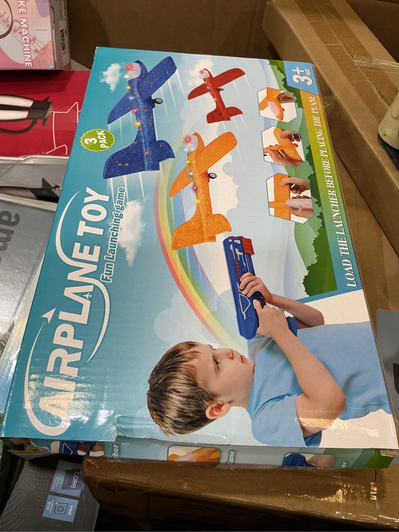 Condition photo showing New/Like New for fuwidvia 3 pack airplane launcher toys, 13.2'' led foam glider plane toy for boys, 2 flight modes outdoor flying toys birthday gifts for boys girls 4 5 6 7 8 9 10 11 12 year old (blue&green&orange)