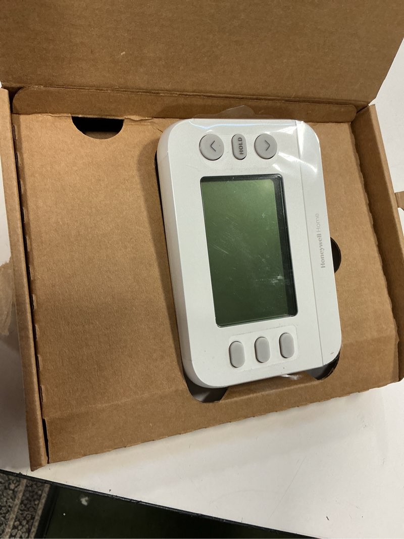 Condition photo showing As Is for New! Honeywell Home Programmable Thermostat, Single-Stage, 1 Heat/1 Cool Compatibility, 5-2 Day Schedule, X2P, White, RTH20B Single-Stage Compatible 5-2 Day Programmable