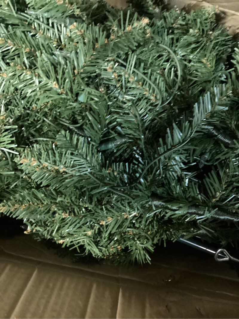 Condition photo showing As Is for puleo international 7.5ft pre-lit fraser fir pencil christmas tree with 350 clear lights, 1188 realistic dense branch tips, easy setup artificial trees with sturdy metal stand 7.5' pencil fraser fir with 350 clear lights