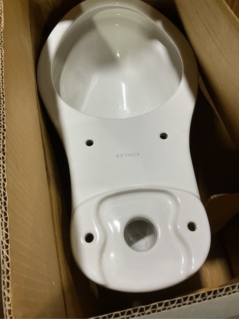 Condition photo showing As Is for kohler elongated toilet, white not complete