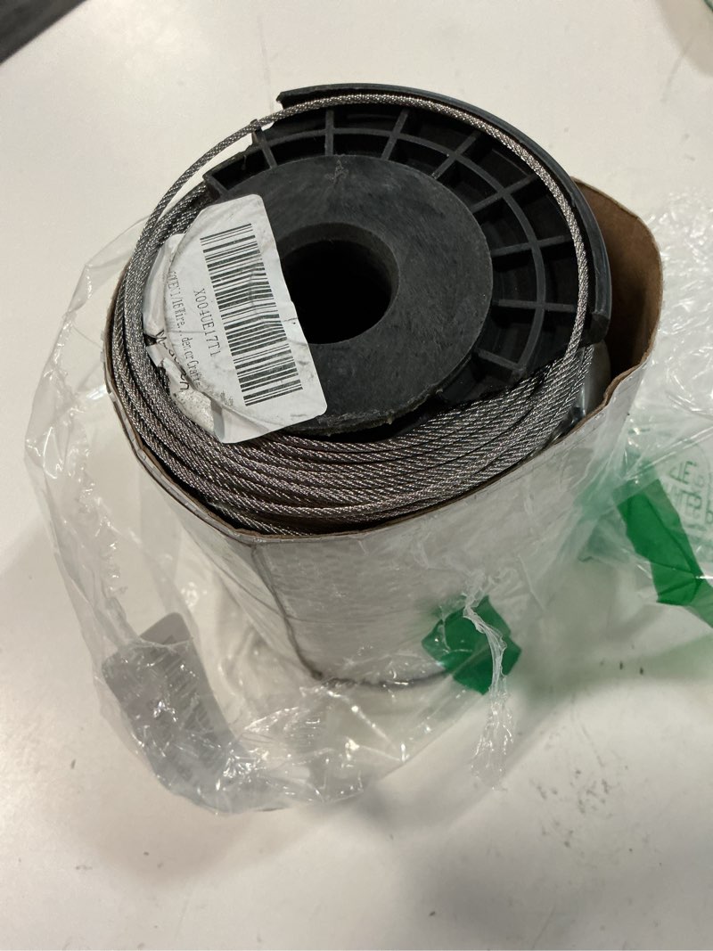 Condition photo showing As Is for 1/16 wire rope, 1000ft 304 stainless steel cable with 300pcs crimp sleeves, aircraft grade, 7x7 strand, 368lbs breaking strength, for garden trellis, clothesline, railing,trellis 1000ft 1