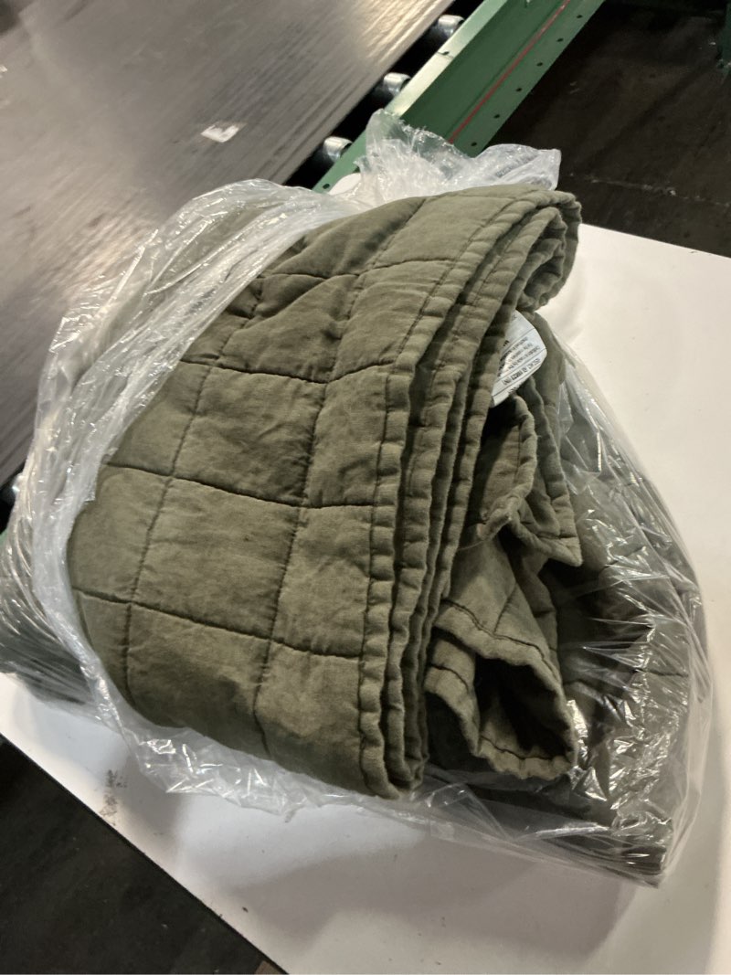Condition photo showing As Is for european linen box quilt, twin, dusty olive