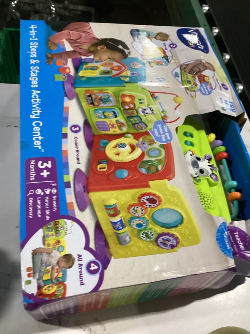 Condition photo showing As Is for vtech baby 4-in-1 steps & stages activity center with accessories, ages 3 to 24 months