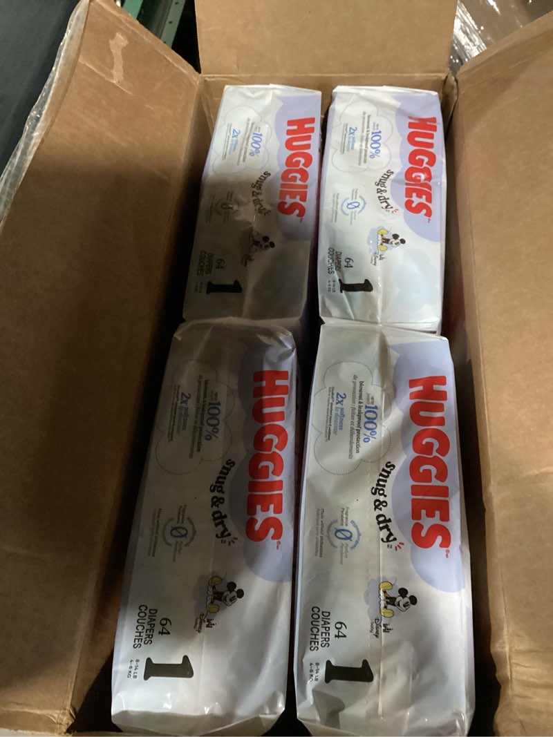 Condition photo showing New/Like New for huggies snug & dry diapers -size 1 - 256ct