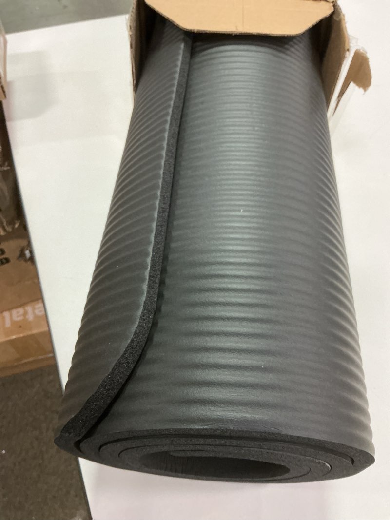 Condition photo showing As Is for Amazon Basics 1/2 Inch Extra Thick Exercise Yoga Mat with Carrying Strap, Cushioned Support, for Fitness and Gym Workouts Black