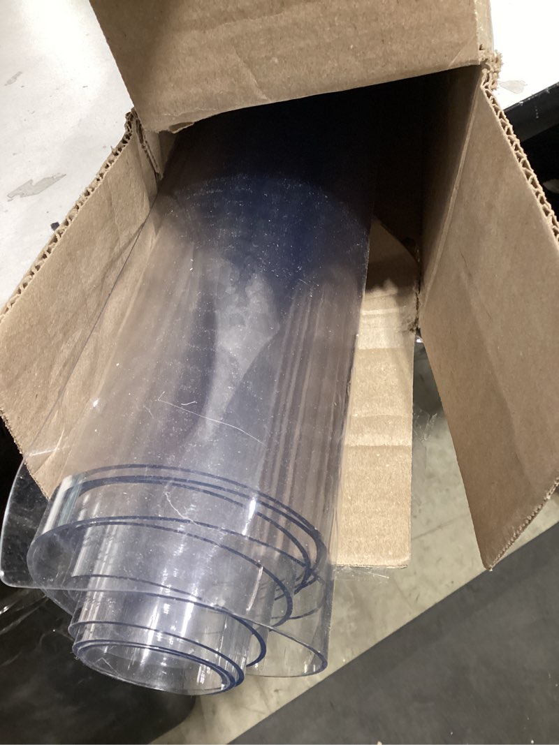 Condition photo showing As Is for 24"X60"Crystal PVC Table Cover Protector, Waterproof PVC Tablecloth, 2MM Thickened Protector for Table, Desk, Coffee Table, Workbench,Dresser, TV Stand, Counter 24"*60" Clear 2mm