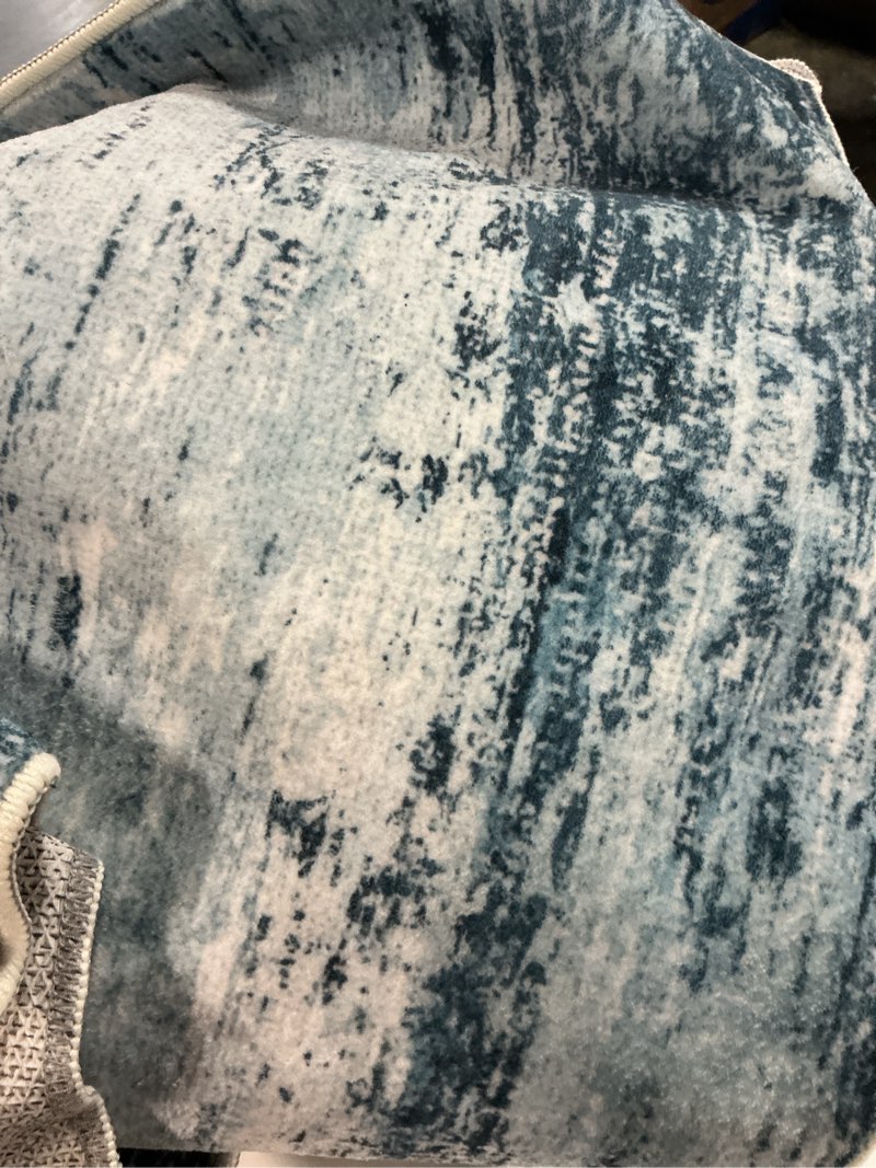 Condition photo showing As Is for AMADA HOMEFURNISHING 9x12 Area Rugs for Living Room, Modern Large Area Rugs with Non-Slip Backing & Low Pile, Neutral Soft Washable Rug for Nursery, Bedroom, Dinning Room, Playroom, Blue Blue 9' x 12' (Rectangular)