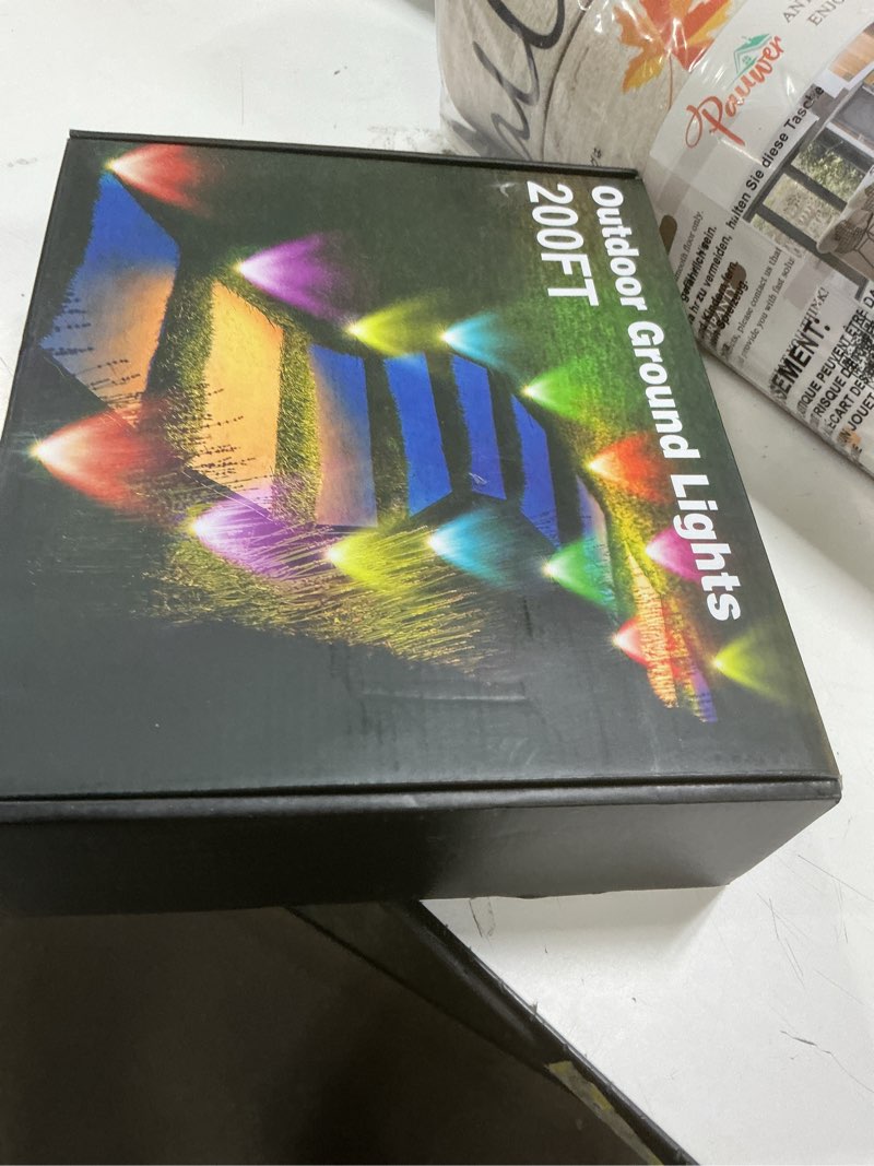 Condition photo showing New/Like New for RGB Outdoor Ground Lights, 200Ft Color Changing Pathway Lights with Remote & App Control, Waterproof Walkway Lighting, Wired for Garden Yard Lawn Patio Best for Holiday Party