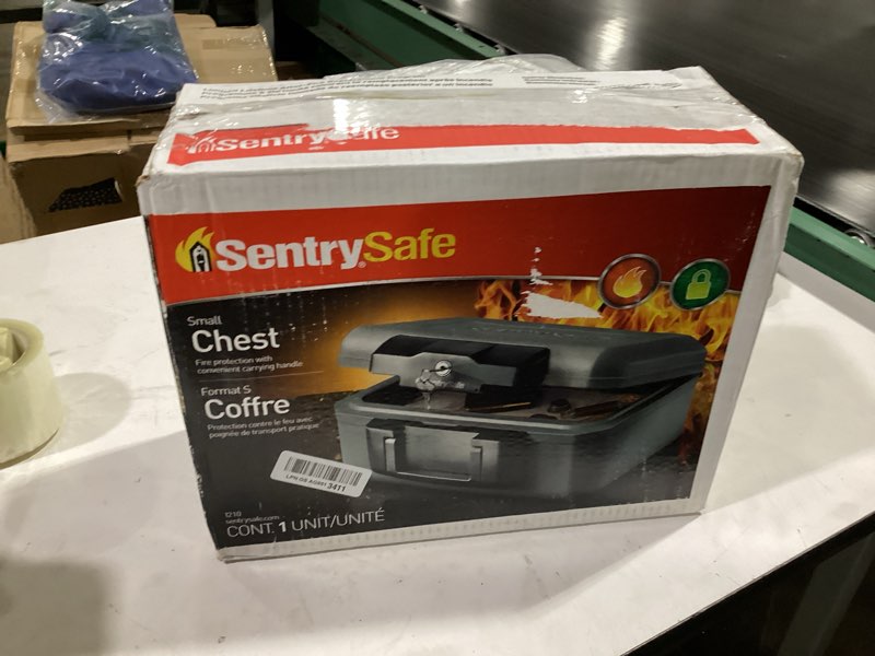 Condition photo showing Good Condition for sentrysafe dark gray fireproof and waterproof safe with key lock, chest lock box with carrying handle for travel, 0.28 cubic feet, 6.6 x 15.4 x 14.3 inches, cfw20201