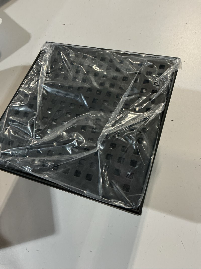 Condition photo showing New/Like New for oatey vivante 6-in matte black square shower drain with square pattern