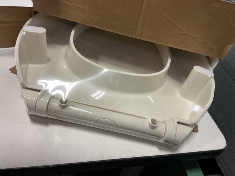 Condition photo showing Good Condition for kohler 25875-96 hyten 3" height, elevated soft close elongated toilet seat, contoured seat with grip-tight bumpers, quick-attach hardware, no slam toilet seat, biscuit biscuit elongated