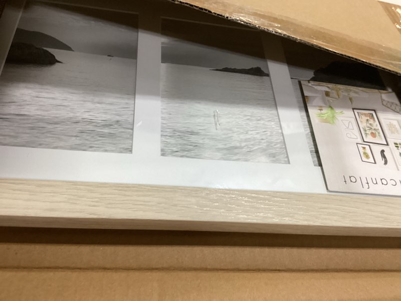 Condition photo showing Good Condition for Americanflat 8x14 Collage Picture Frame in Light Wood - Displays Three 4x6 Frame Openings - Engineered Wood Panoramic Picture Frame with Shatter Resistant Glass, Hanging Hardware, and Easel
