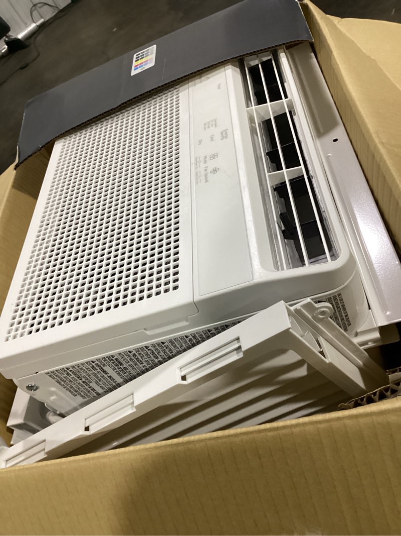 Condition photo showing Good Condition for 5,000 btu 115-volt window air conditioner 150 sq. ft. rooms with remote in white