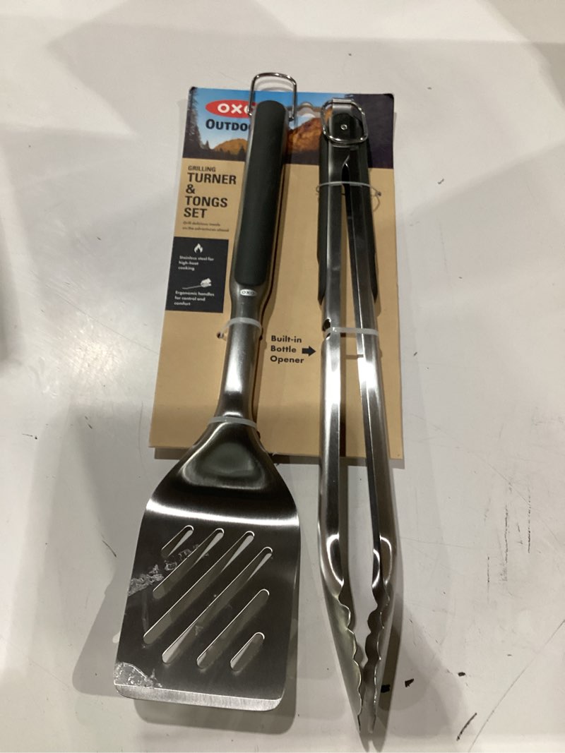 Condition photo showing New/Like New for oxo outdoor grilling turner and tongs set
