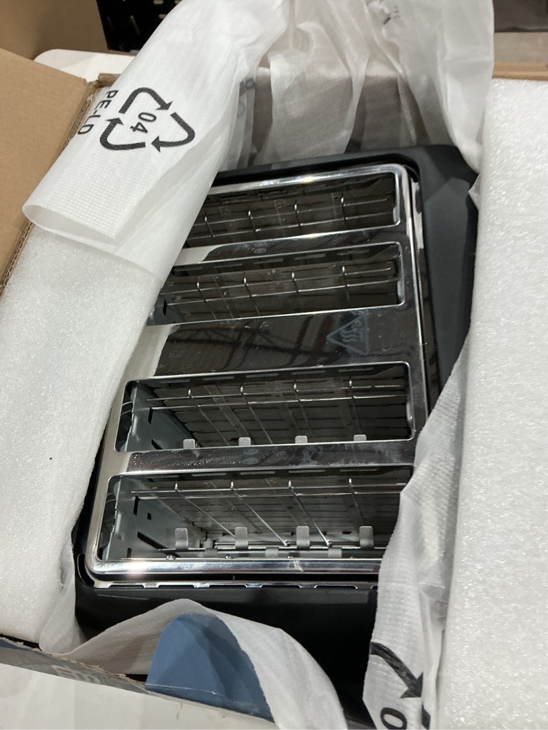 Condition photo showing Good Condition for west bend toaster 4-slice extra-wide and deep slots with 3 functions and 7 shade settings manual toast lift lever auto shut-off and removable crumb tray, 1500-watts, black