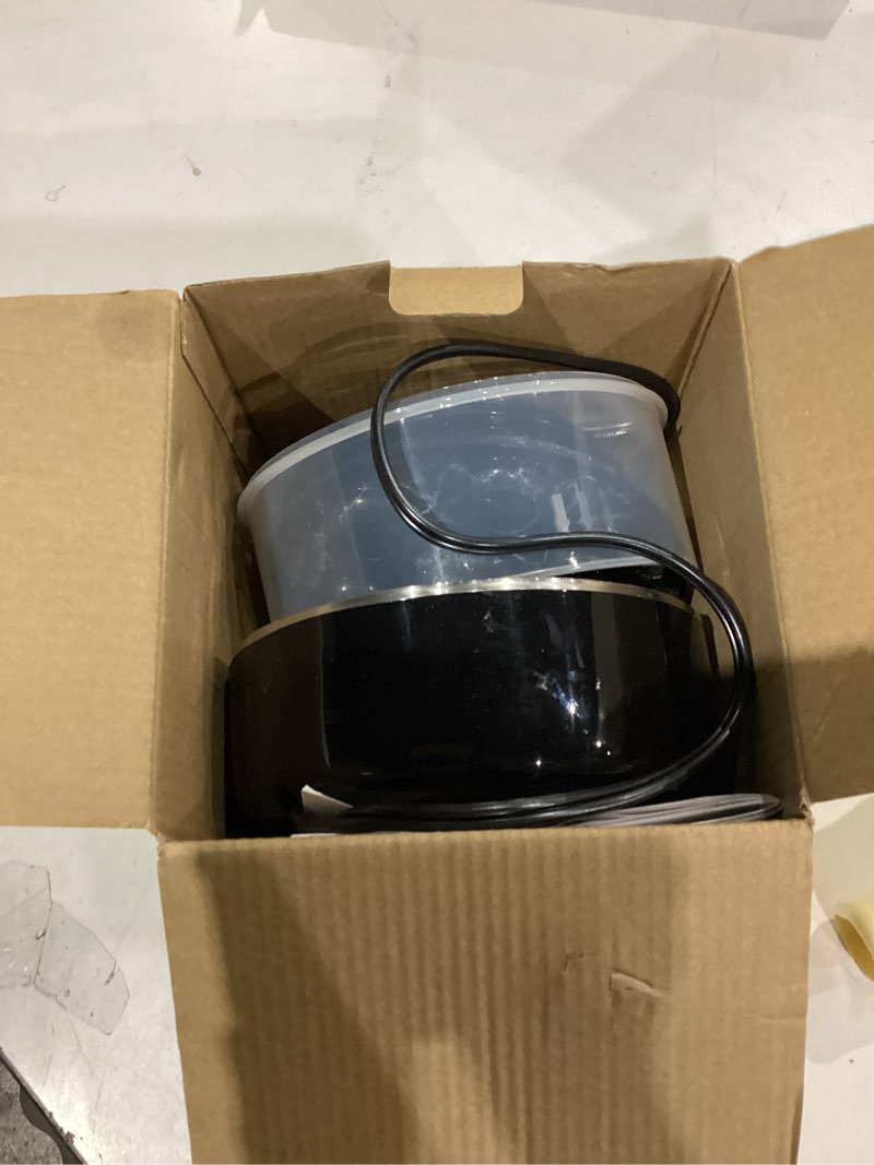 Condition photo showing As Is for Elite Gourmet EGC1215B Easy Egg Cooker, Stainless-steel Heating Plate, Two-Tiered, 14-Egg Capacity, Soft, Medium, Hard-Boiled, Auto Shut-Off, Omelets, Poached Eggs, Measuring Cup, Piercing Pin, Black 14-Egg Black