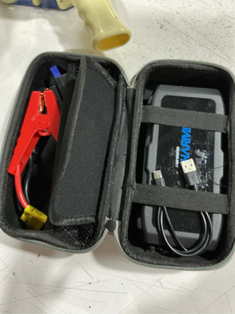 Condition photo showing As Is for sharmeal jump starter 6000a, 12v car battery jump starter (up to all gas or 10.0l diesel engine), battery booster with 3 modes flashlight and jumper cable black-6000a