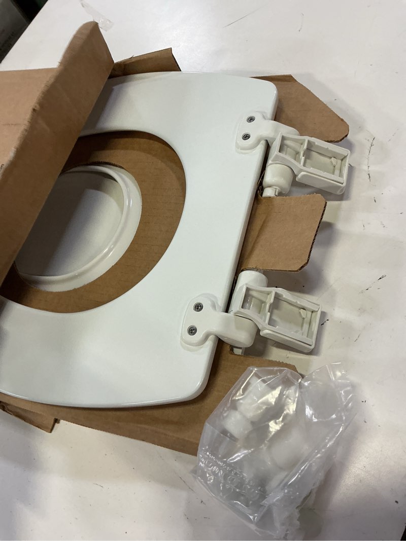 Condition photo showing Good Condition for mayfair nextstep2 toilet seat with built-in potty training seat, slow-close, removable that will never loosen, elongated, white elongated 1