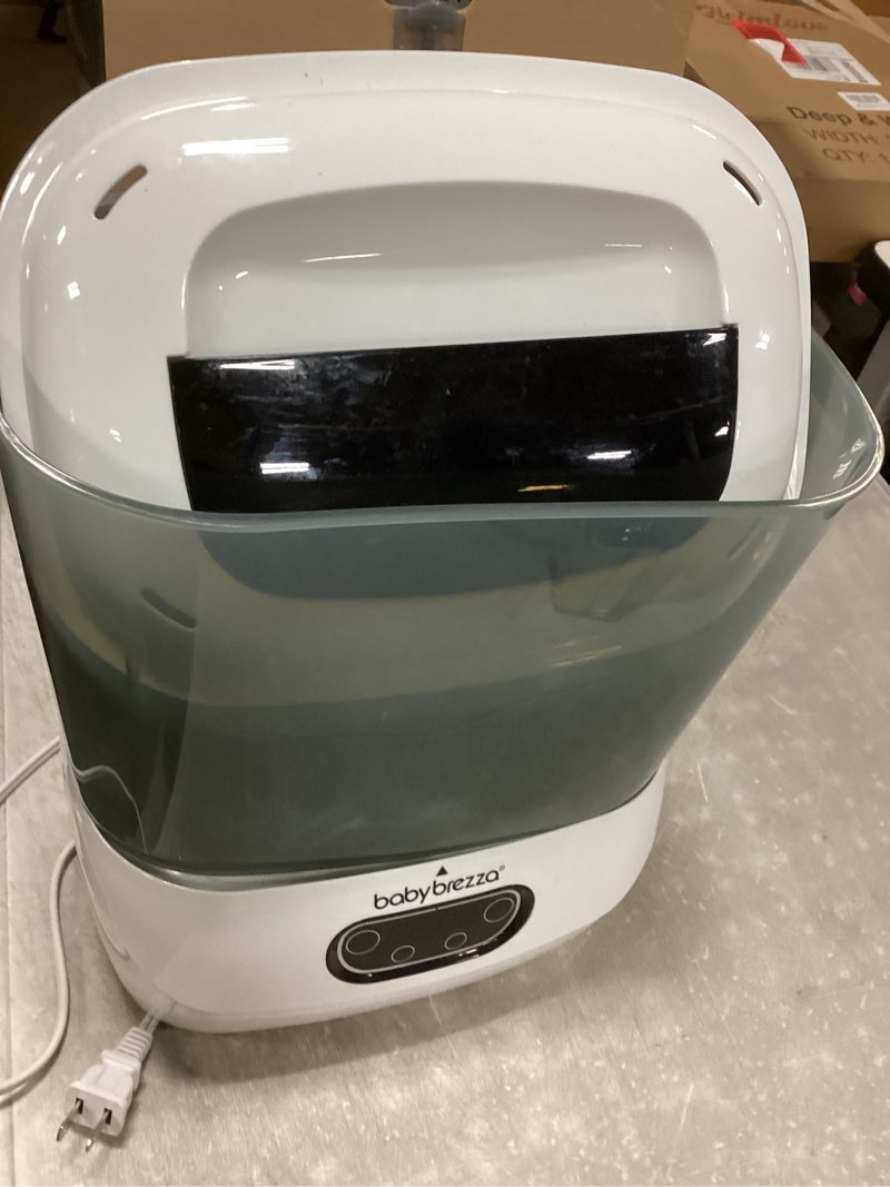 Condition photo showing As Is for Baby Brezza Bottle Sterilizer and Dryer Advanced – 33% Faster - Largest Capacity Steam Sanitizer - Universal Sterilization Machine for All Bottles + Pump Parts - HEPA Air Filter