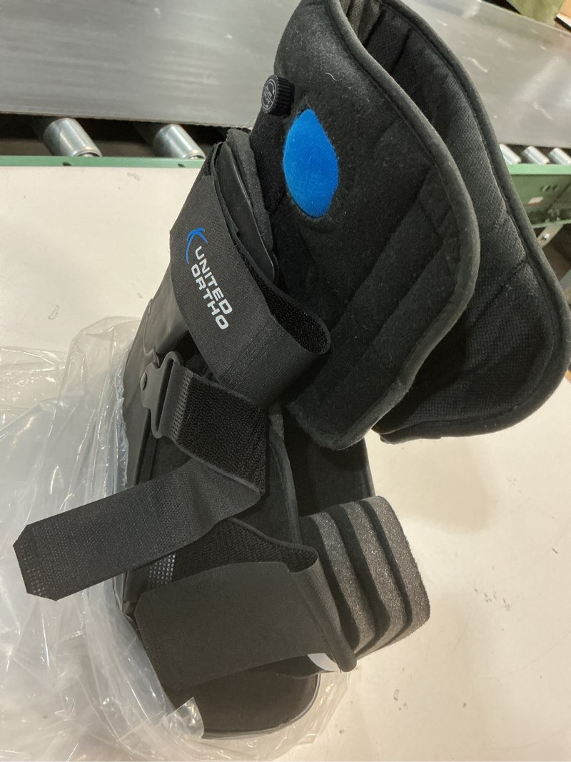 Condition photo showing As Is for united ortho short air cam walker fracture boot, small, black black small boot