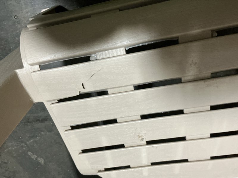 Condition photo showing As Is for putty plastic adirondack chair with cup and phone holder