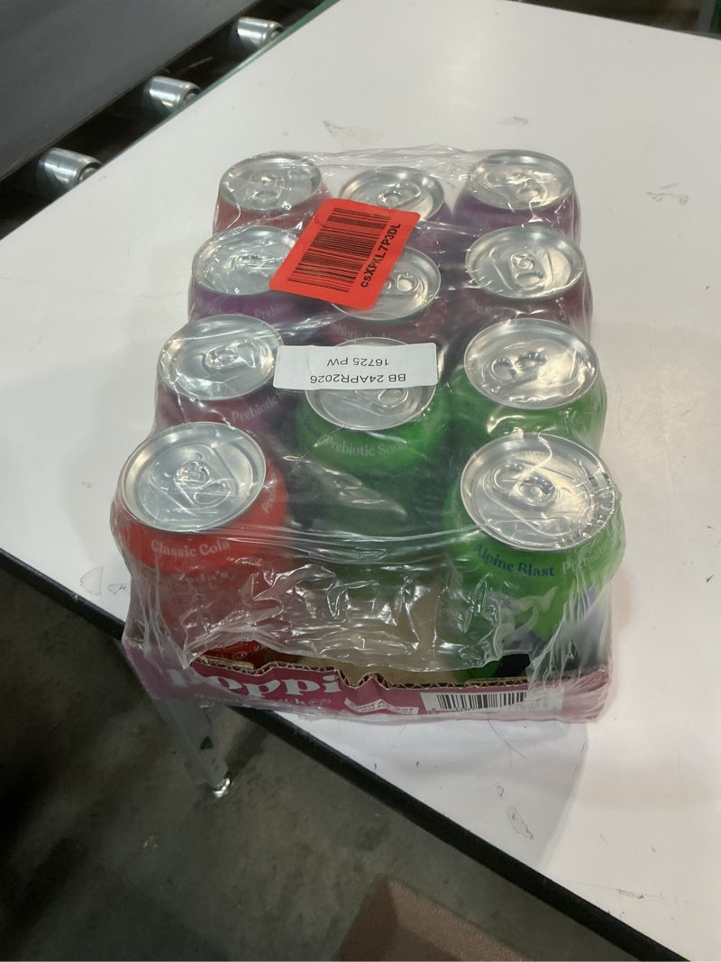 Condition photo showing New/Like New for (BB:25/03/2026) Poppi Sparkling Prebiotic Soda Beverage with Apple Cider Vinegar, Seltzer Water and Fruit Juice, Soda Staples Variety Pack, 11 FL Oz, Pack of 12, Packaging May Vary (Variety) Soda Staples 11 Fl Oz (Pack of 11)