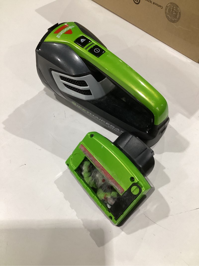 Condition photo showing As Is for (used, not tested, missing parts)bissell pet hair eraser cordless hand vacuum, lithium ion, home, auto, and pet vacuum, easy-empty dirt bin, upholstery tool, brush tool, and crevice tool included, 2390a