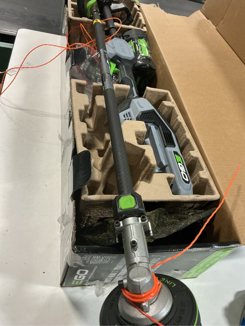 Condition photo showing As Is for ego power+ multi-head system with line iq, powerload 56-volt 17-in straight shaft attachment capable battery string trimmer edger conversion capable 5 ah (battery included) (charger included)