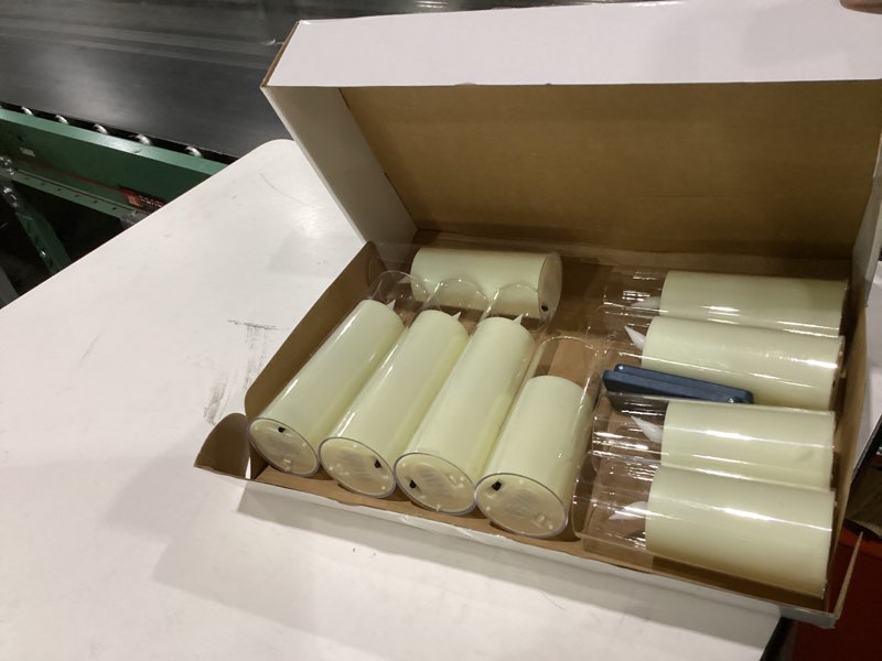Condition photo showing Good Condition for amagic ivory flameless candles with remote, battery operated candles with timer, acrylic plexiglass flickering led fake candle for wedding, holiday, home decor, set of 9, d2.2 x h5 6" 7" ivory white & warm yellow glow