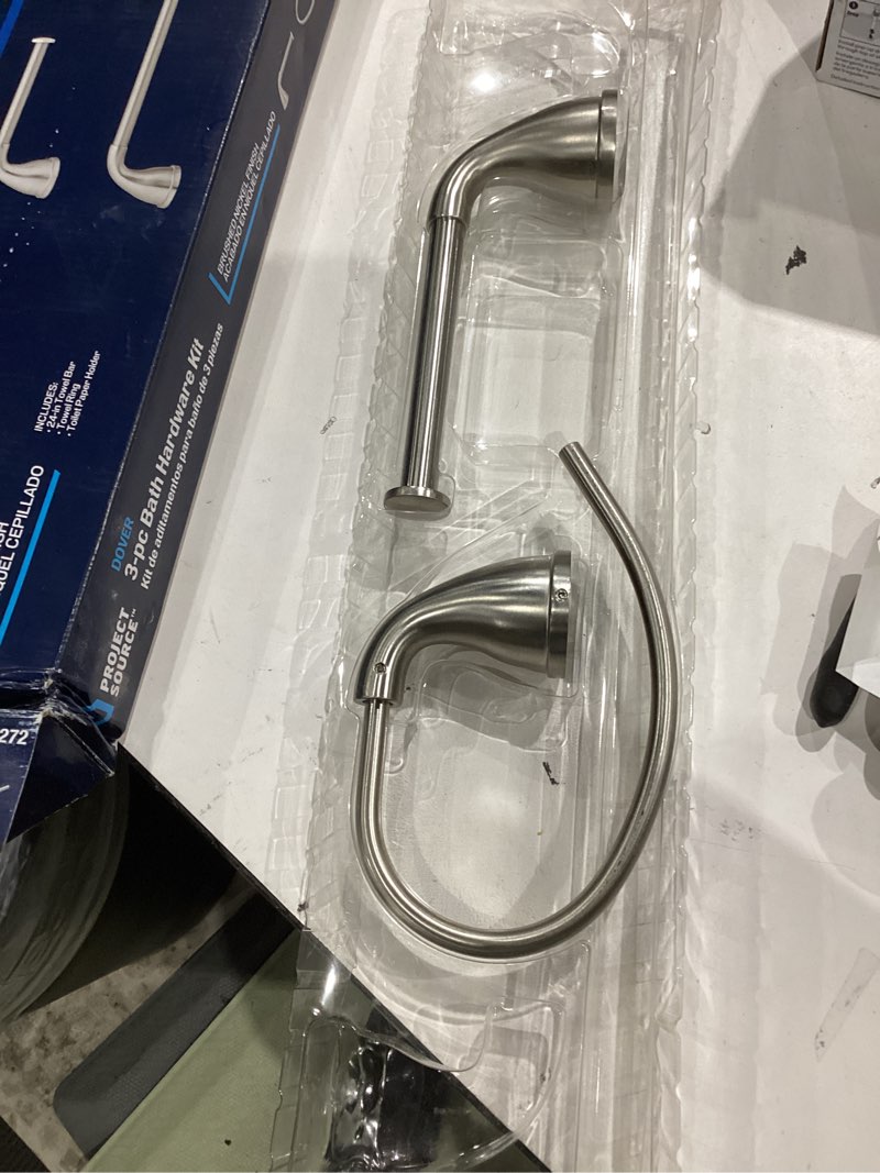 Condition photo showing As Is for project source 3-piece dover brushed nickel decorative bathroom hardware set with towel bar, toilet paper holder, towel ring and robe hook