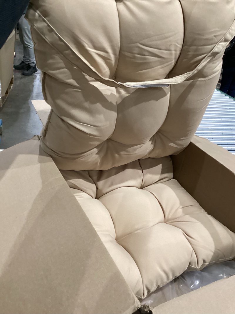 beige tufted chair cushion, likely for an indoor or outdoor chair. 