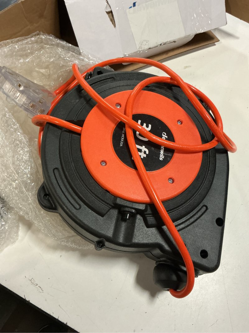 Condition photo showing Good Condition for dewenwils 30ft retractable extension cord reel, 16/3c sjtw heavy duty power cord, lighted triple outlets, 10a circuit breaker, lightweight 180° swivel bracket, ceiling/wall mount, etl listed, orange