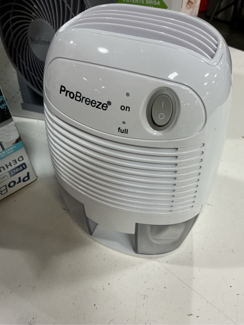 Condition photo showing As Is for pro breeze mini portable dehumidifier, 17oz ultra quiet compact peltier dehumidifier, 215 sqft 1pack