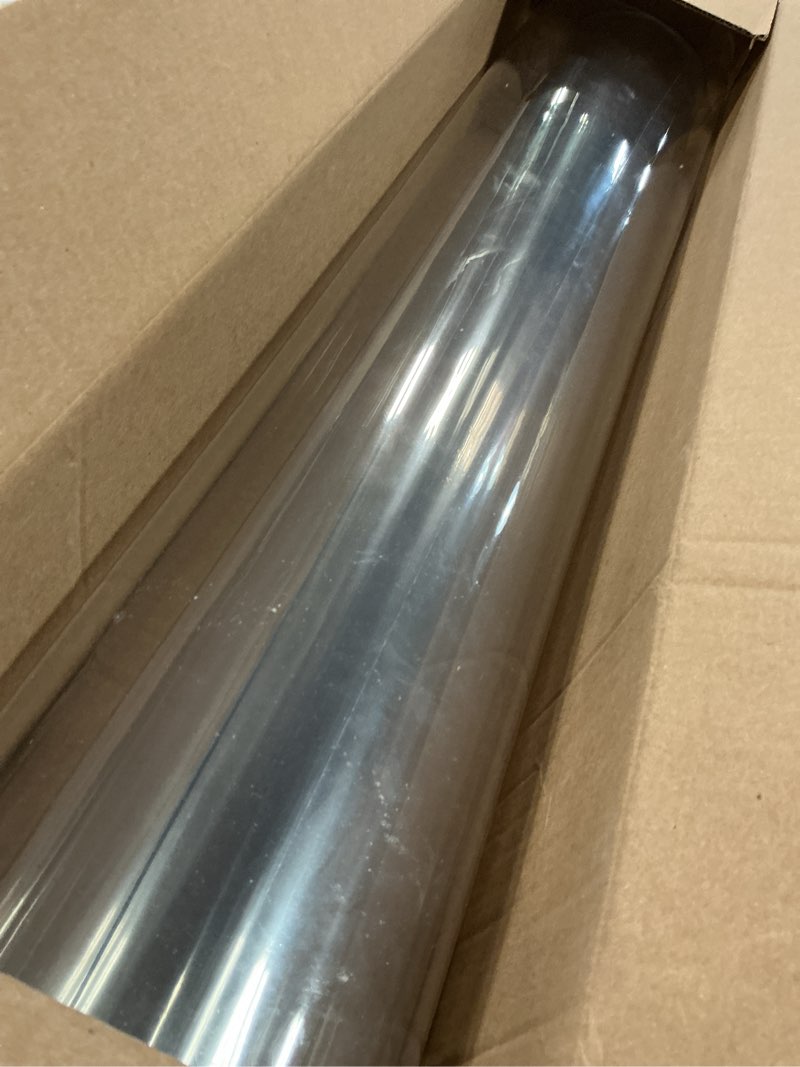 Condition photo showing As Is for LovePads Clear Table Cover Protector, 30 x 60 Inch 2mm Thick Plastic Table Cover, Table Protector for Dining Room Table, Waterproof Dresser Cover Top for Kitchen, Coffee, Writing Desk 30" x 60" (Rectangular) Clear 2mm