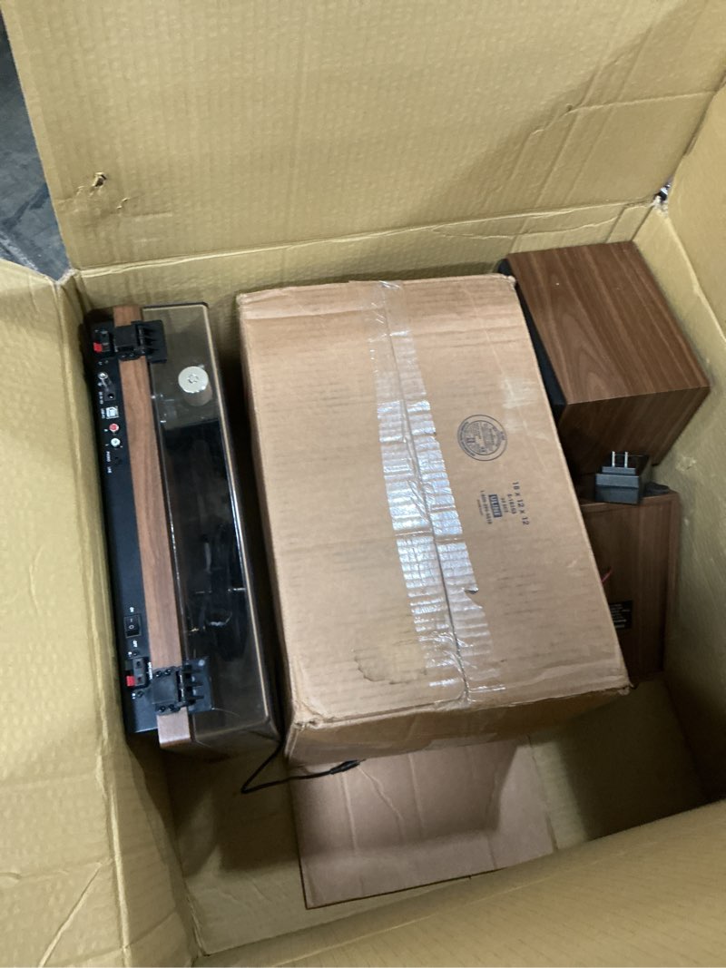 Condition photo showing As Is for bluetooth turntable hifi system with 36 watt bookshelf speakers, patend designed vinyl record player with magnetic cartridge, bluetooth playback and auto off brown