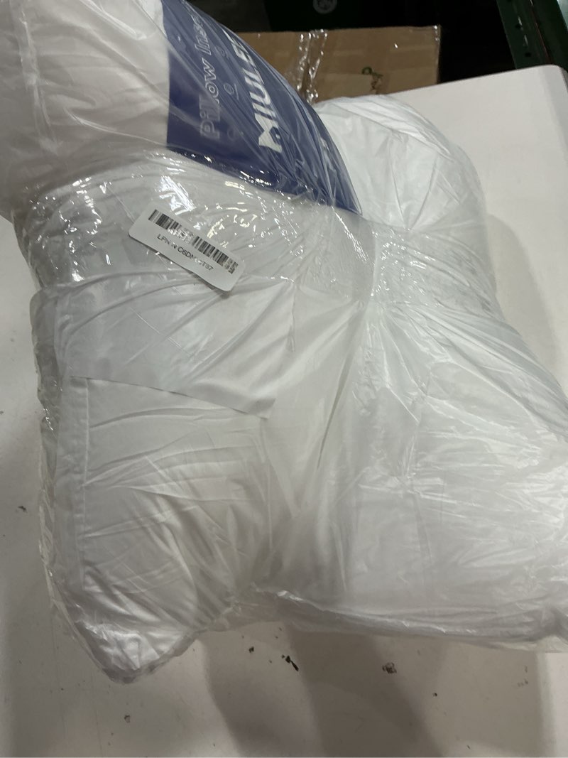 Condition photo showing As Is for miulee throw pillows inserts, pack of 2 20x20 inch 100% virgin fiber filling bed couch pillows