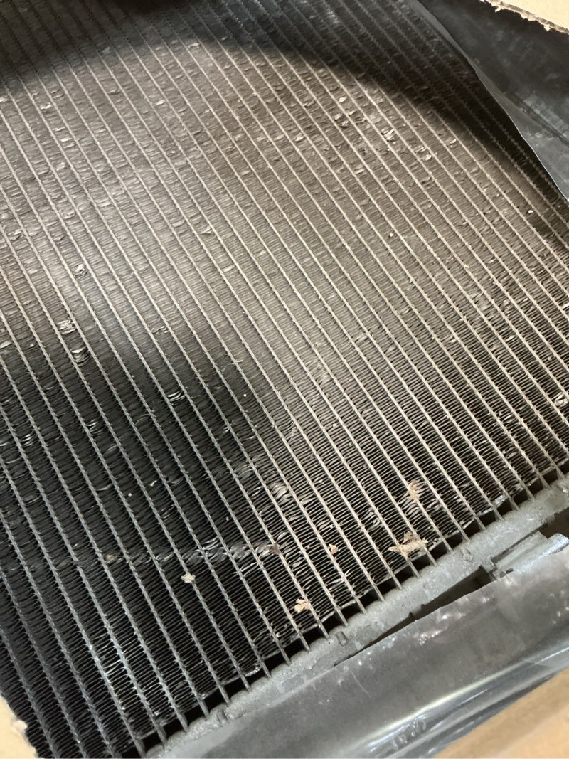 Condition photo showing As Is for radiator replacement for 2008-2013 infiniti g37 coupe sedan convertible, 2007-2008 infiniti g35 sedan, 2011-2012 infiniti g25, 2010-2020 nissan 370z, 2014-2015 infiniti q60, 2015 infiniti q40