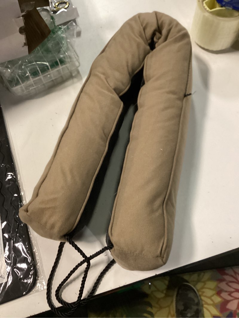 Condition photo showing As Is for hyha 32 Inch Door Draft Stopper, Blocks Hot Cold Air with Removable Washable Cover, Gaps Up to 3 Inch, All-Season Noise and Wind Seal, Under Draft Stopper for Bottom of Door Window, Taupe Taupe 32in