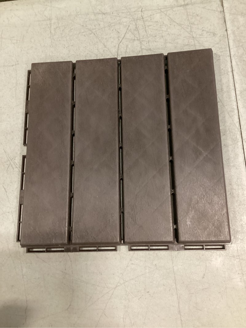 Condition photo showing Good Condition for total outdoor living 12" x 12" composite deck tiles,9 pack interlocking plastic flooring for patio, deck,and outdoor spaces, dark brown