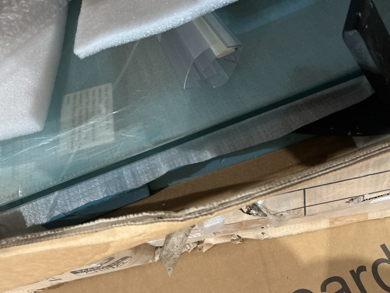 Condition photo showing As Is for item similar )))incomplete . frameless sliding bathtub door 56-60 in.w x 60 in.h frameless shower glass door frameless double sliding tub door with 5/16 in clear tempered glass and stainless steel handle black finish