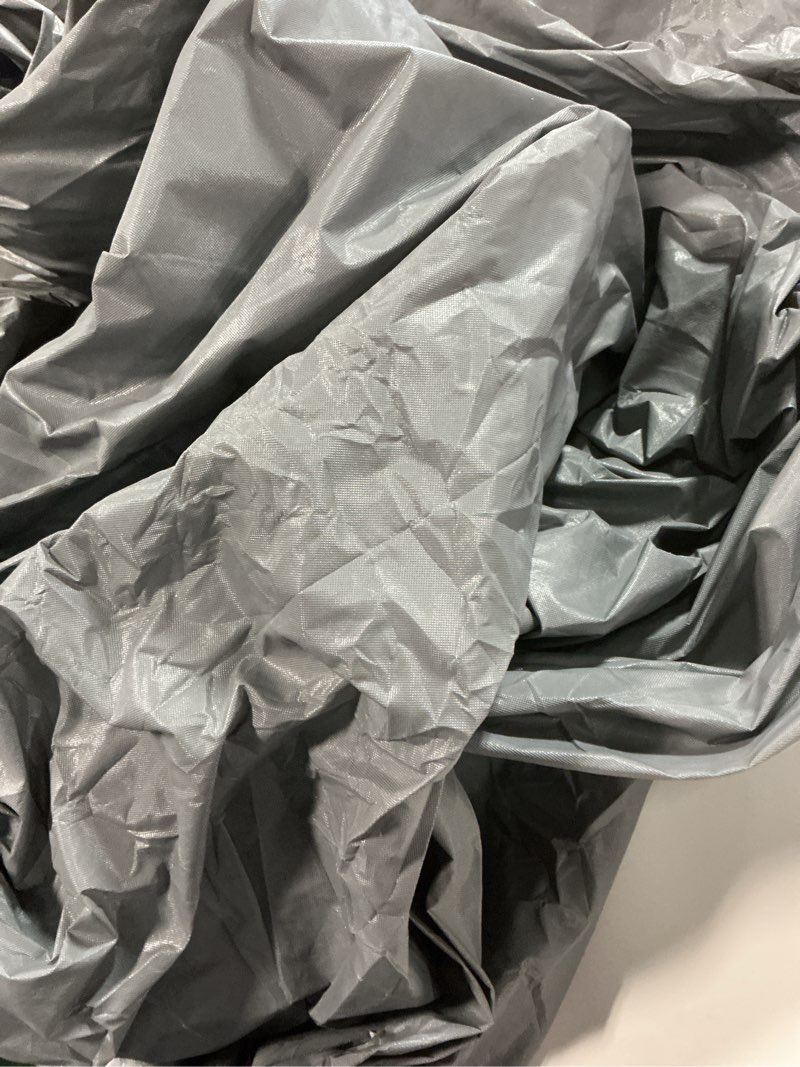 Condition photo showing As Is for Similar Car Cover Dirtproof, Waterproof, Breathable, Snow Dustproof, Indoor and Limited Outdoor Car Covers Fits Sedans up to 200\", Gray