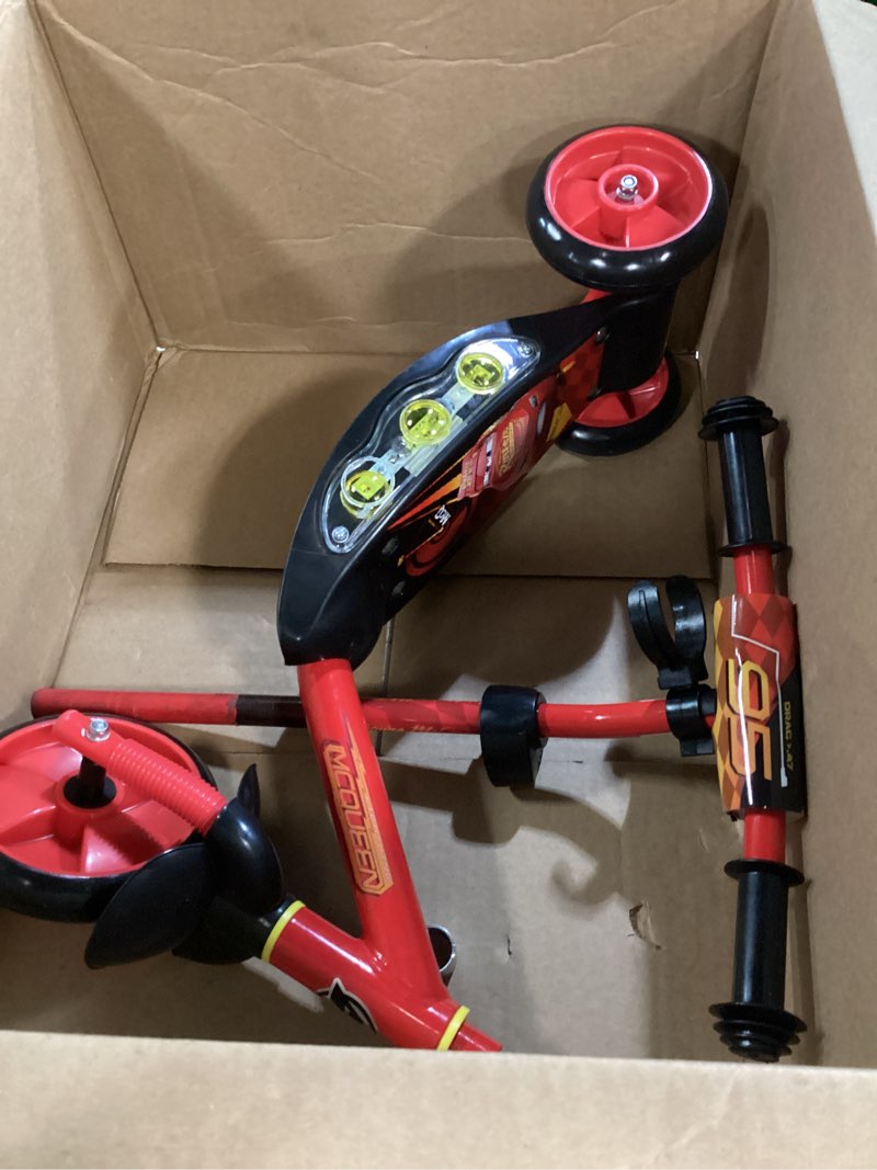 Condition photo showing As Is for huffy toddler 3-wheel scooter for kids, multiple colors & licensed character graphics, ages 3+, durable steel frame, wide non-slip deck, stable lean-to-steer design, light-up options, girls/boys cars | red