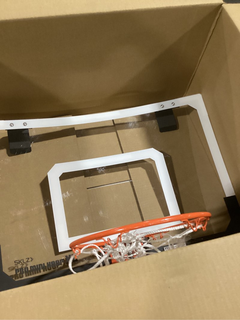Condition photo showing As Is for SKLZ Pro Mini Indoor Basketball Hoop - Over The Door – Portable - Great For Home, Dorms, Offices, and Gifts XL