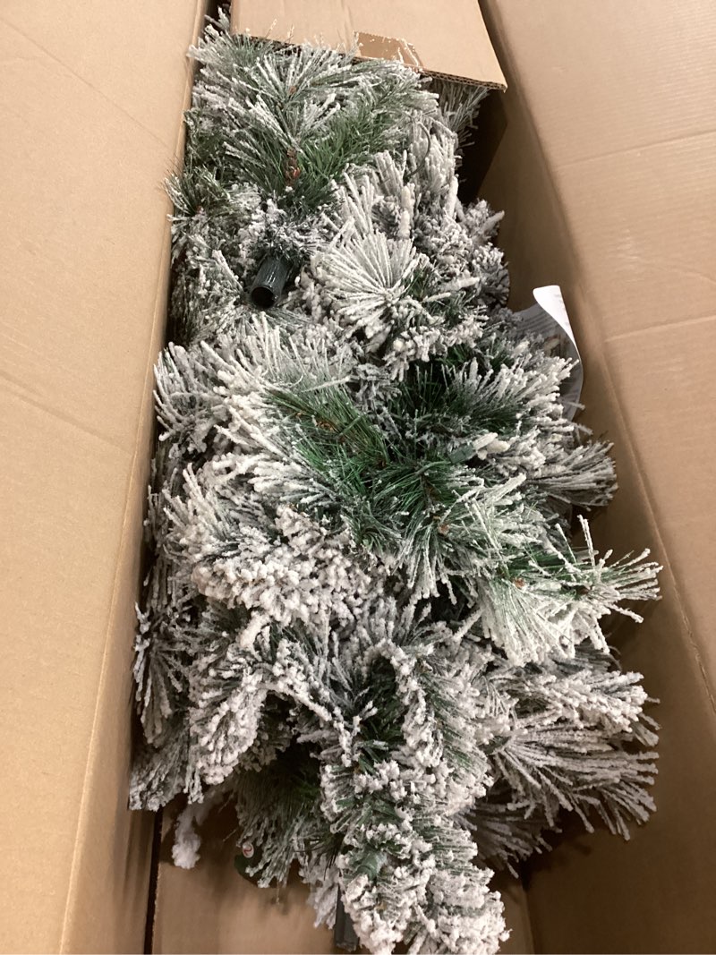 Condition photo showing Good Condition for Puleo International 6.5ft Pre-Lit Flocked Portland Pine Pencil Christmas Tree with 300 Clear Lights, 410 Realistic Dense Snow Flocked Branch Tips, Easy Setup Artificial Trees with Sturdy Metal Stand 6.5' Flocked Portland Pine 300 Clear Lights
