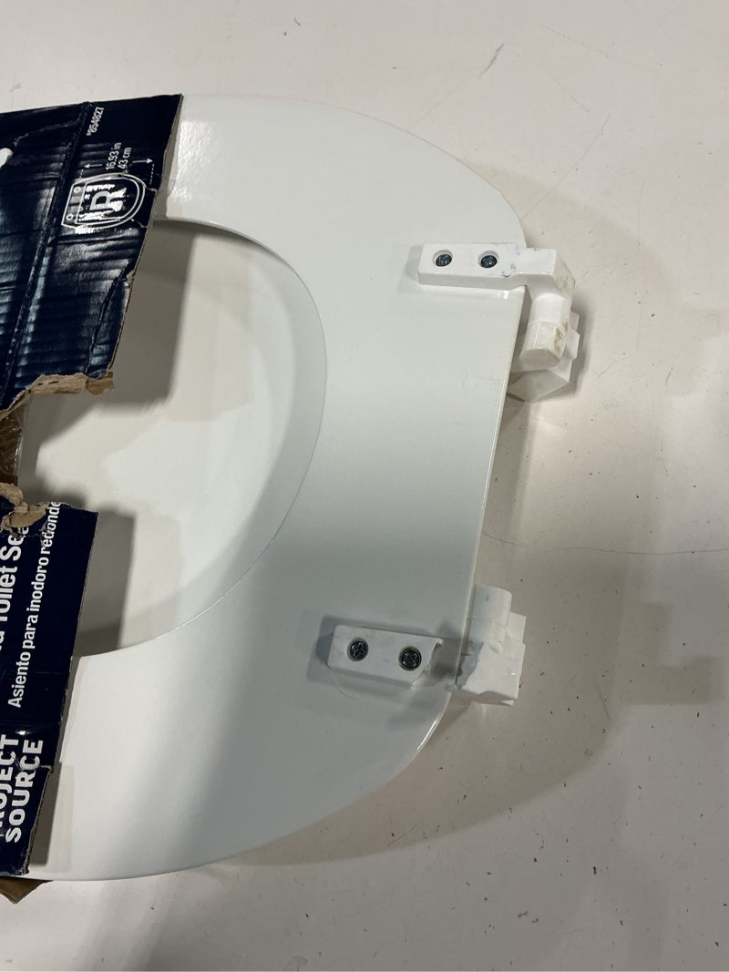 Condition photo showing As Is for Project Source 854827 Round Toilet Seat White Wood