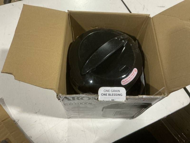 Condition photo showing As Is for aroma digital rice cooker, 4-cup (uncooked) / 8-cup (cooked), steamer, grain cooker, multicooker, 2 qt, stainless steel exterior, arc-914sbd 4 cup uncooked / 8 cup cooked