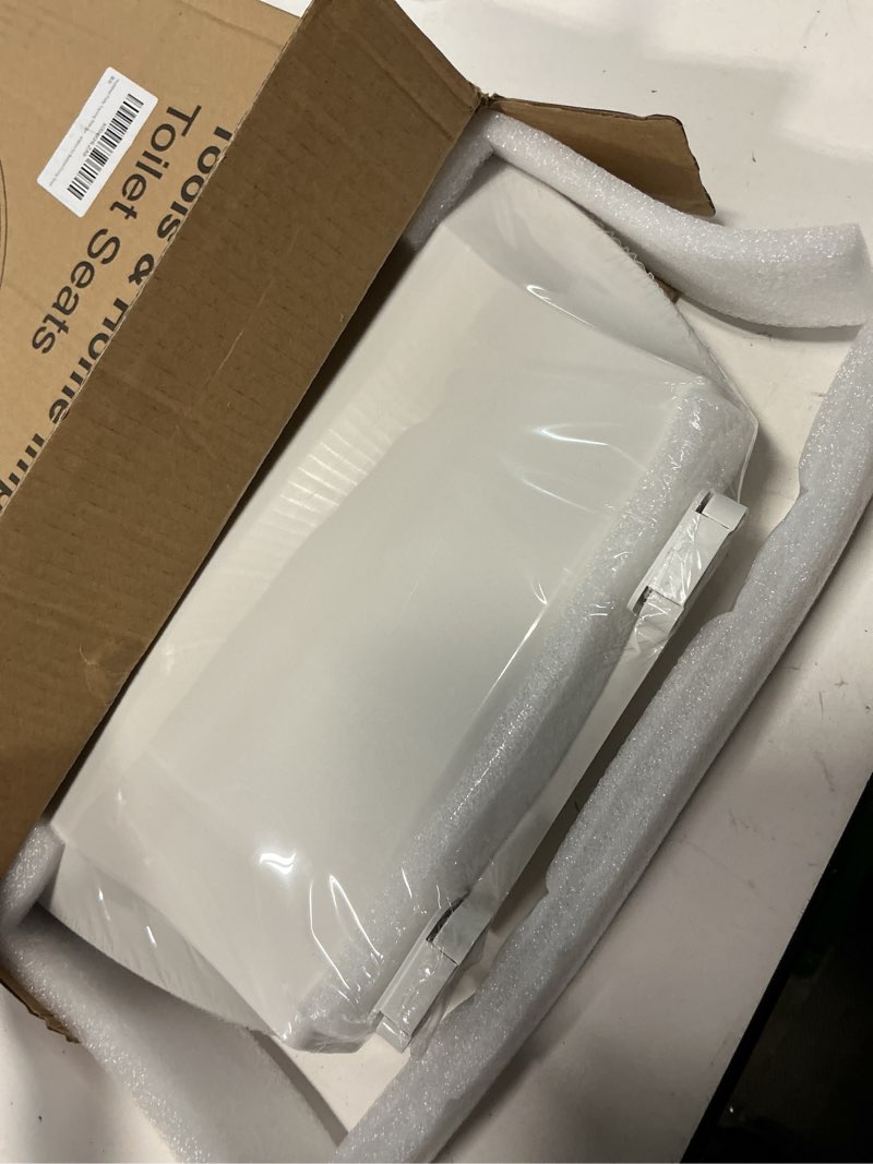 Condition photo showing Good Condition for huttdmel potty training seat built-in toilet seat, elongated toilet seat 16.5inch with baby seat 2 in 1 soft close quiet no slapping, magnetic absorption, easy installation for bottom fixing toilet white elongated 18.5inch with baby seat