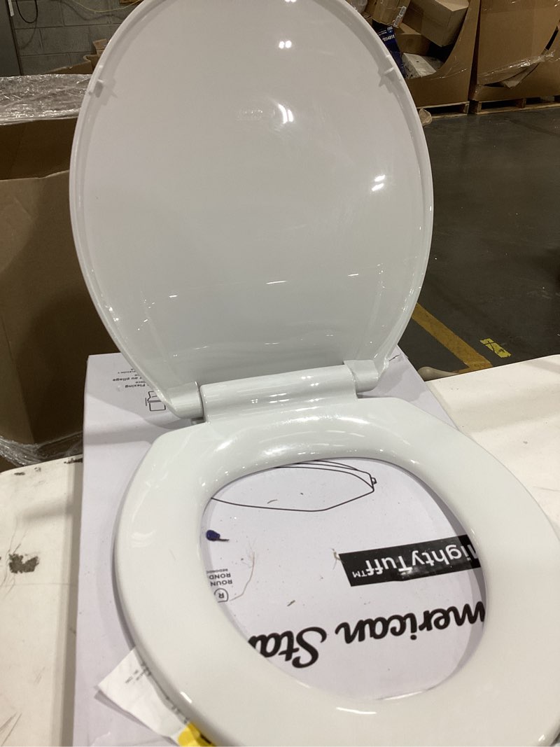 Condition photo showing Good Condition for american standard mightytuff plastic white round soft close toilet seat